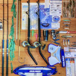 Fishing Gear organized on a wooden floor