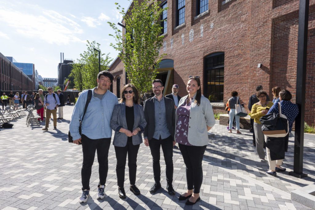 CambridgeSeven architects stand in front of the Foundry in Cambridge