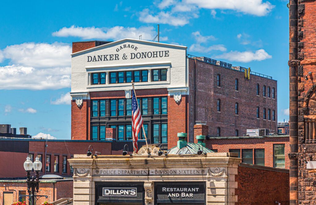 Mixed use renovation of former Danker & Donohue parking garage.