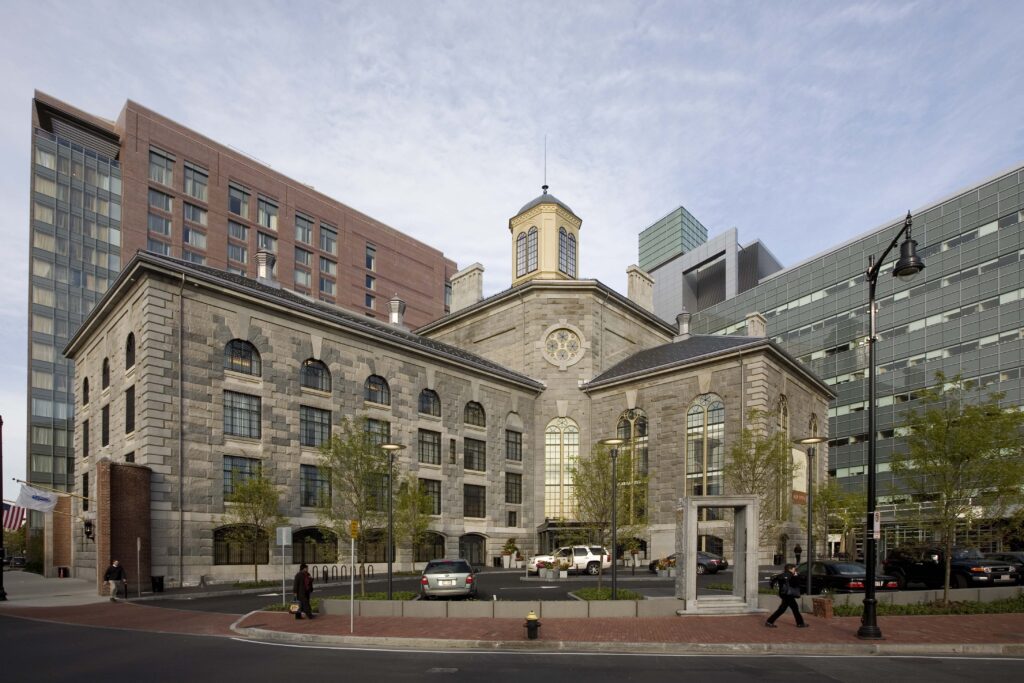 Boutique Liberty hotel with restored masonry and new addition